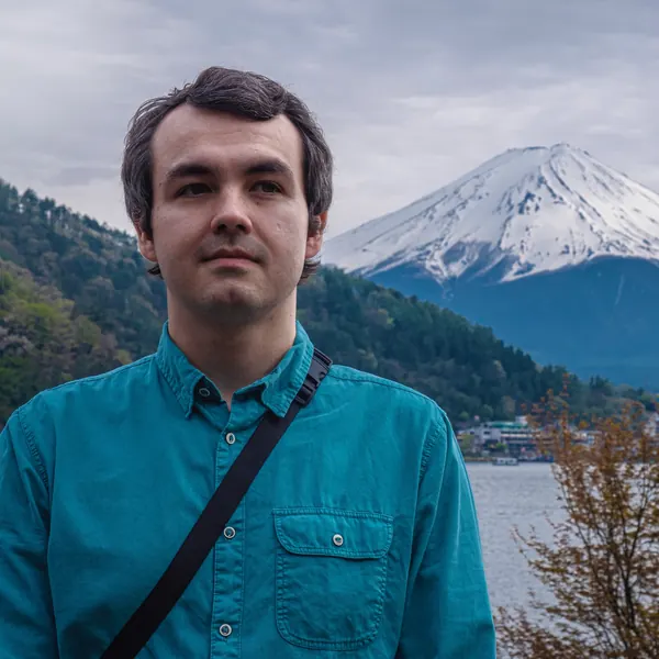 Ivan Mezhenin with Mount Fuji behind him